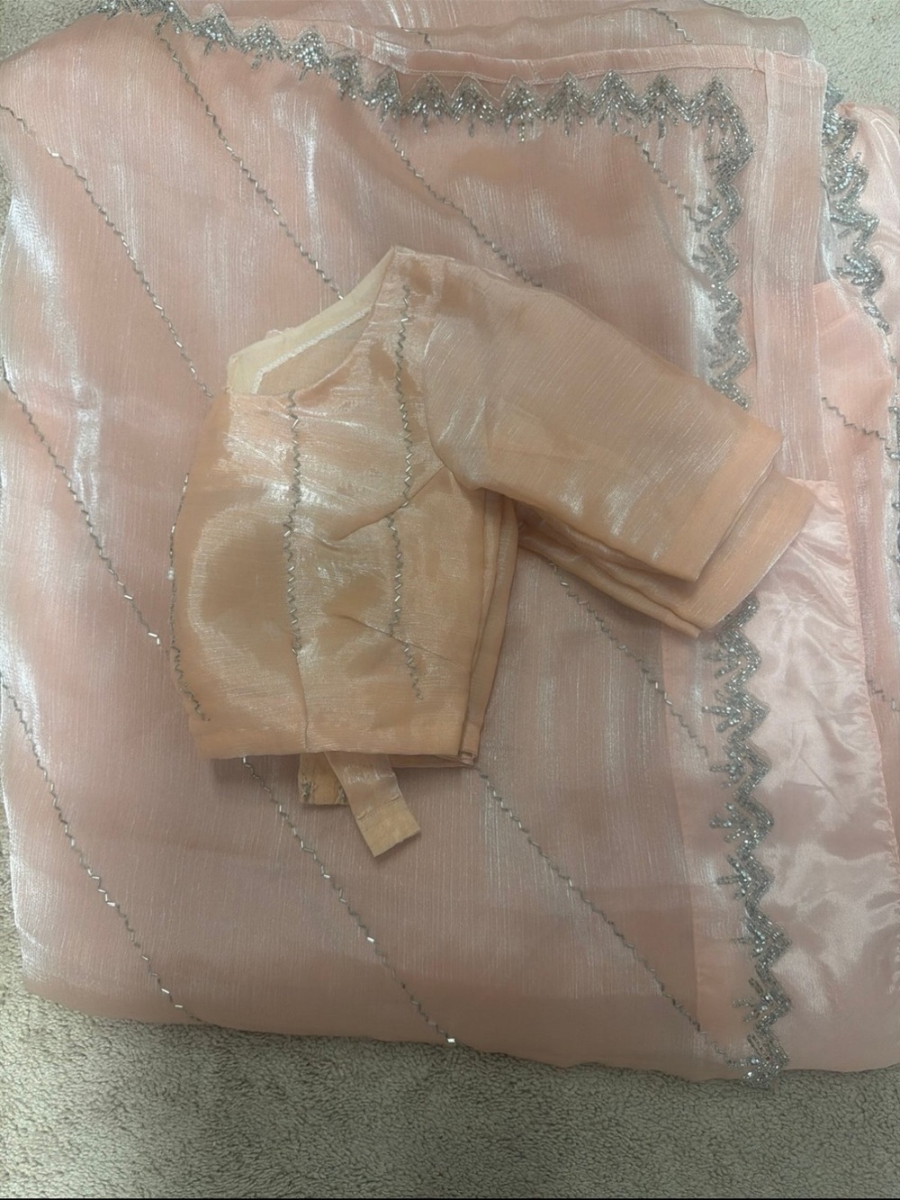 Pretty peach tissue silk saree